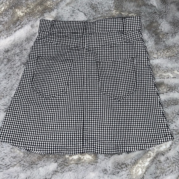 checkered brandy melville skirt with cute button. - Picture 2 of 2